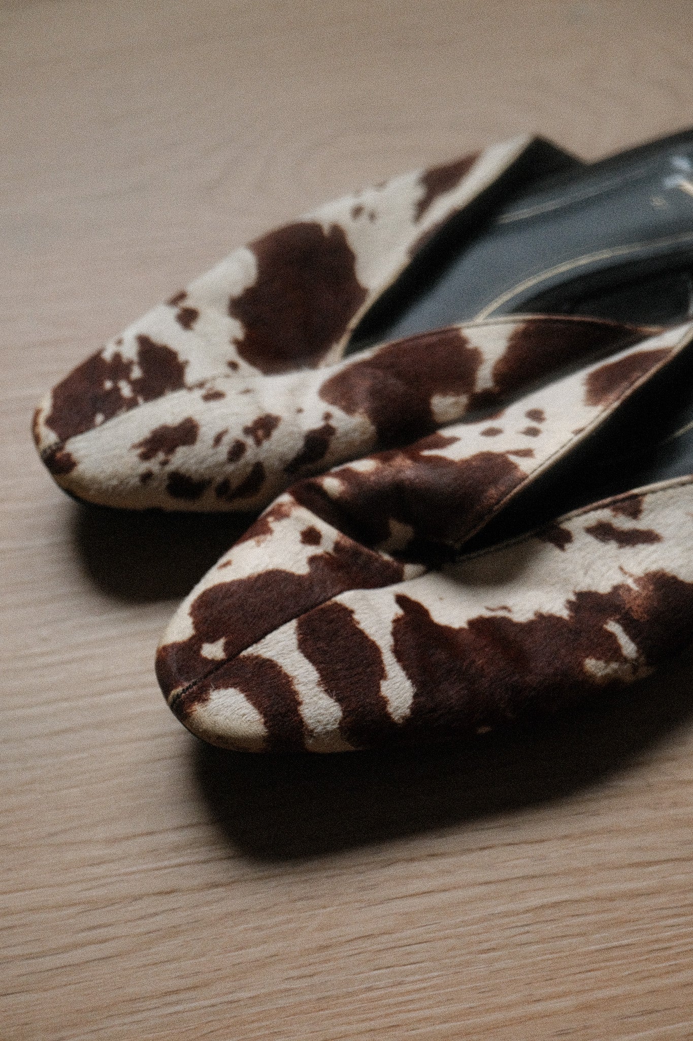 Modern x Leather Cow Print Mules