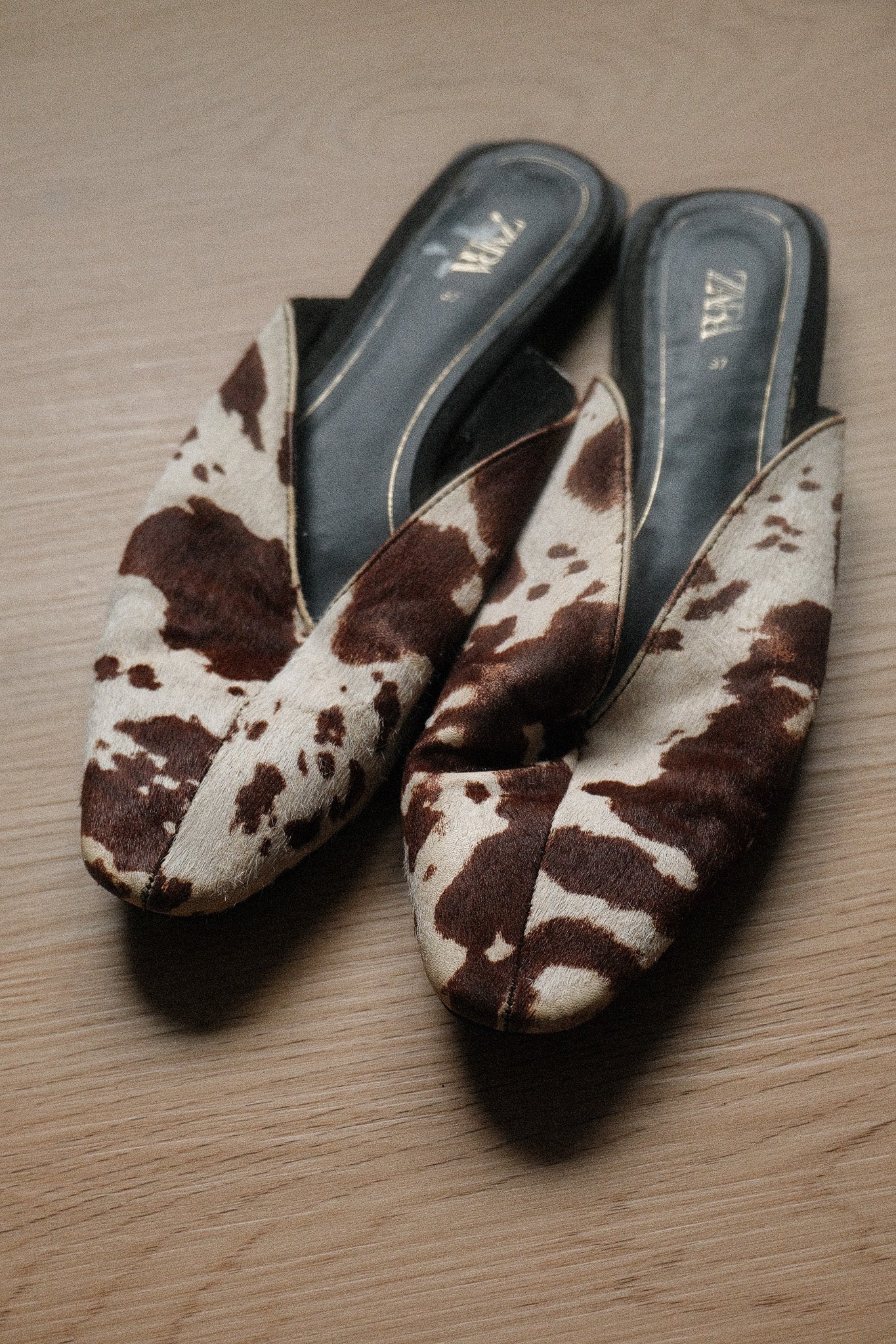 Modern x Leather Cow Print Mules
