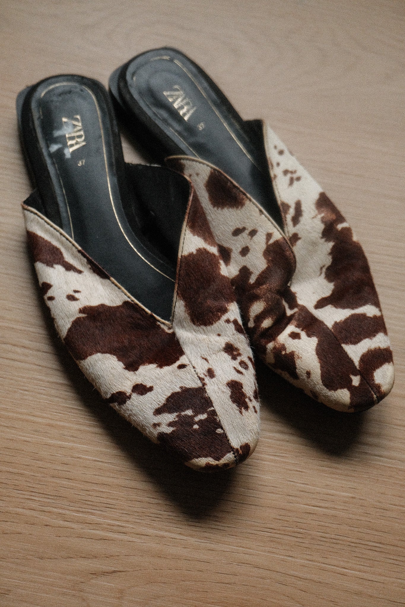Modern x Leather Cow Print Mules